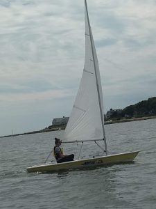 sailing in a laser sailboat