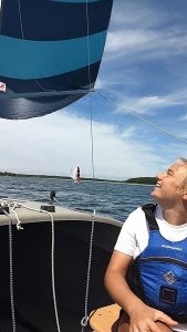 instructor laughing while setting chute